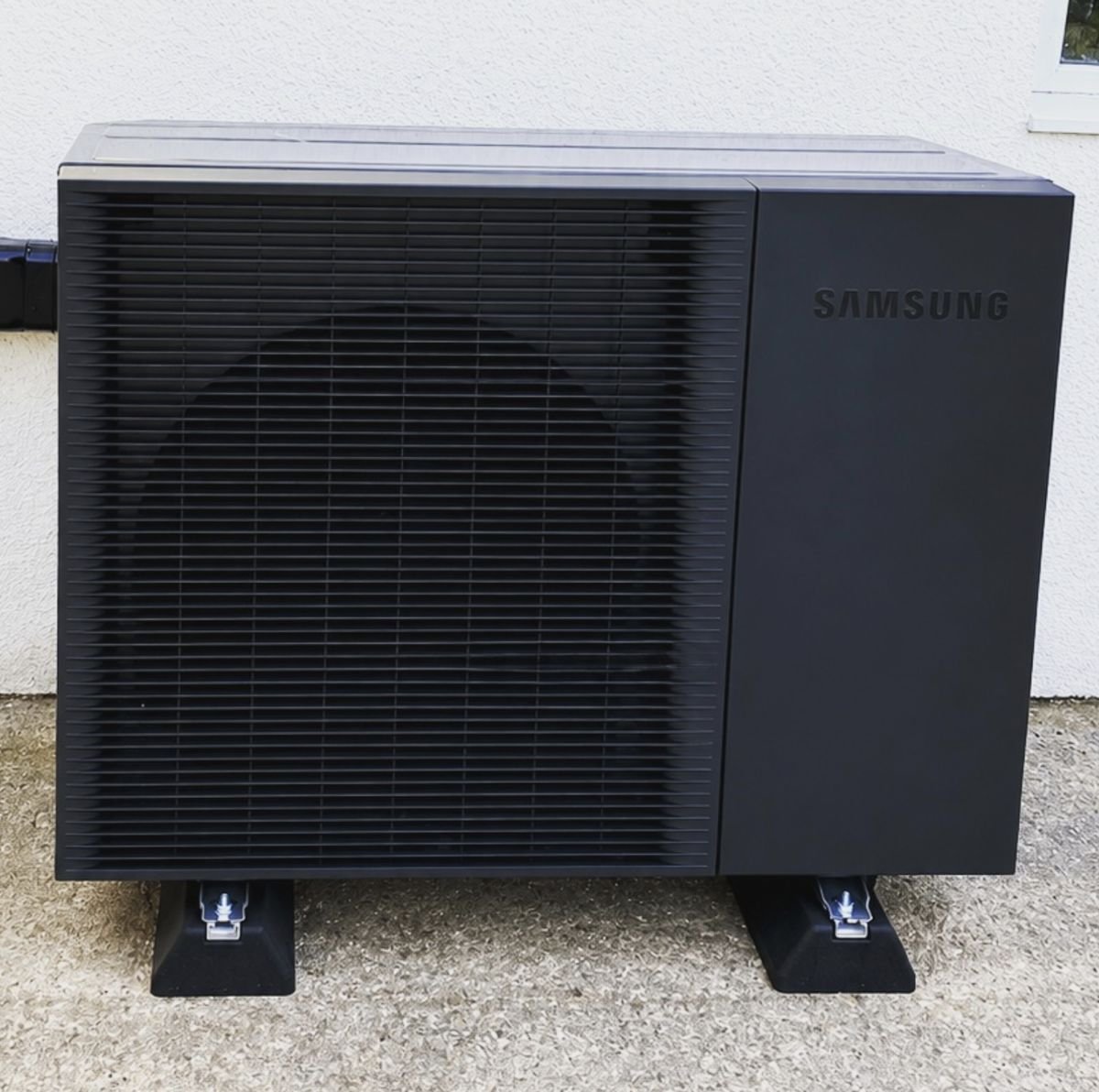 Black Samsung air source heat pump on anti-vibration feet
